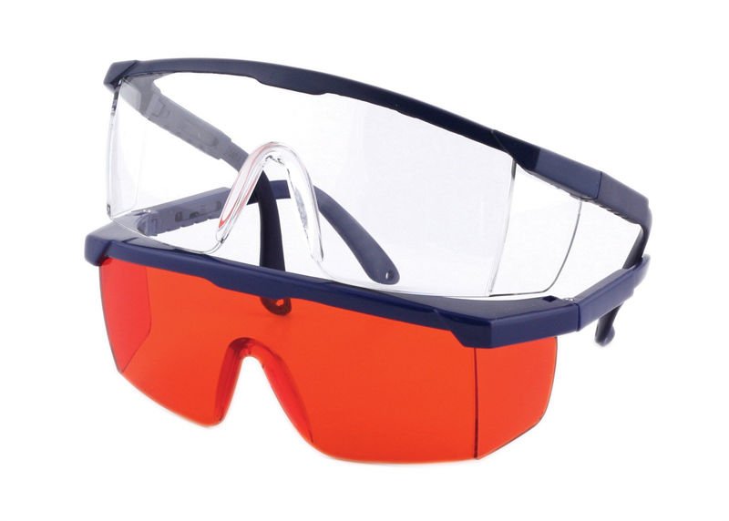 Two pairs of safety glasses: one with clear lenses and the other with red-tinted lenses, featuring navy blue frames