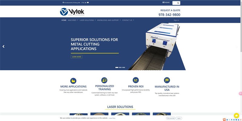 A screenshot of the Vytek Laser website homepage featuring their metal cutting machine.