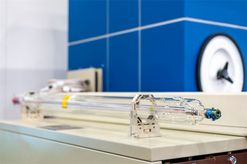 CO2 Glass Laser Tube in a Laboratory Setting CO2 glass laser tube on a laboratory bench